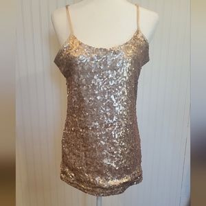 Bke size lg champagne sequence tank top with low cut back.